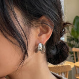 Essential Waves Ohrstecker Silber