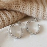 Boucles d'oreilles créoles martelées petit argent