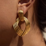 Twist & Glow Ohrstecker Gold