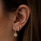 Clous d'oreilles Triconia or