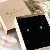 Star stud earrings gold