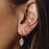 Triconia ear studs gold
